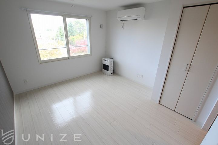 北海道札幌市豊平区中の島二条3(マンション)の賃貸物件の居間