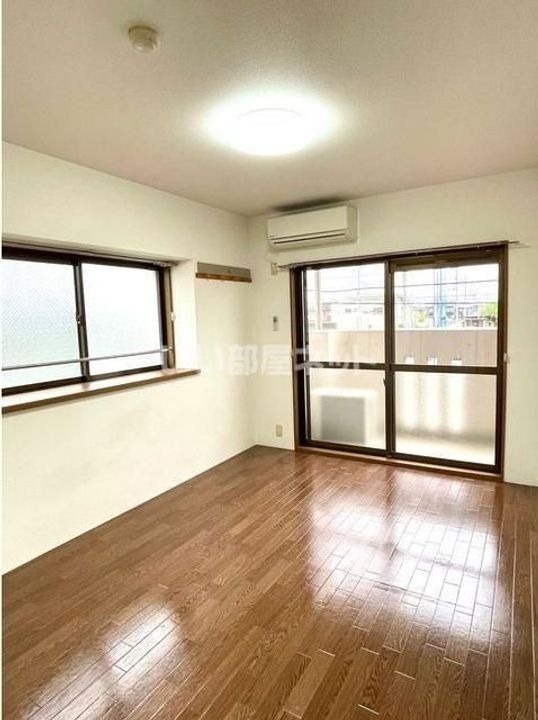 群馬県伊勢崎市宮子町(マンション)の賃貸物件の居間