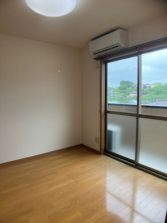 プチメゾン久山ADの居間