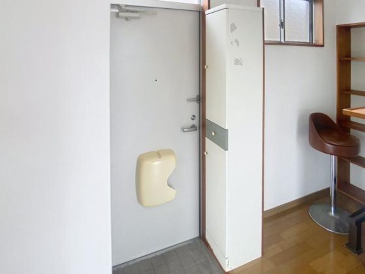 西村マンションの玄関