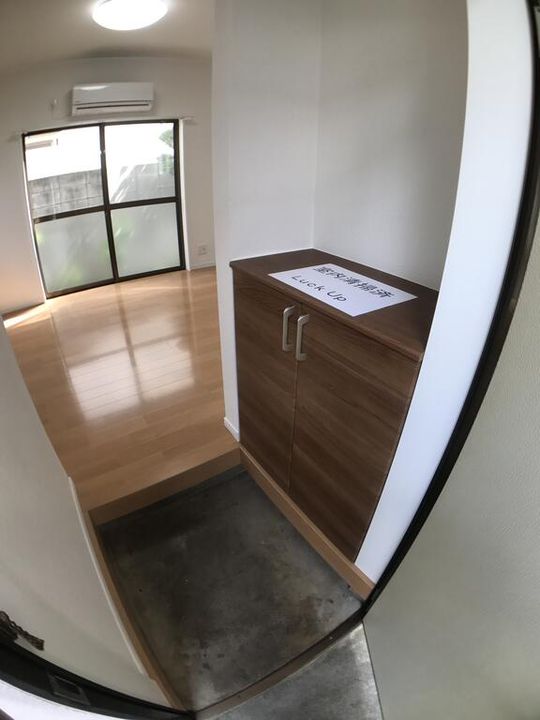 キャビンセキマチの玄関