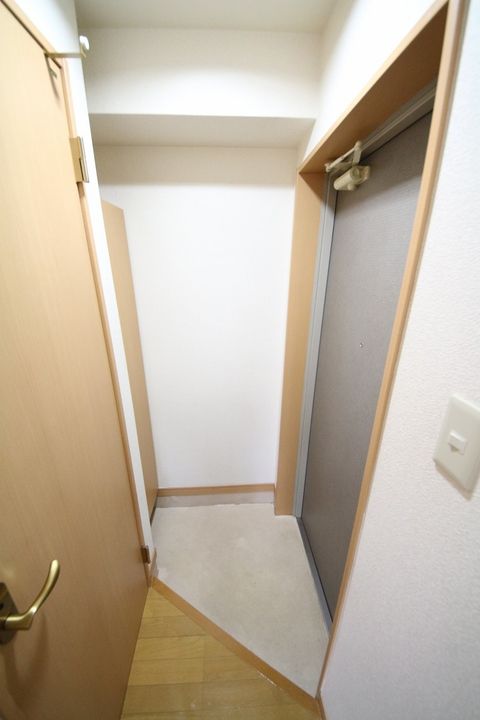ボヌール三萩野の玄関