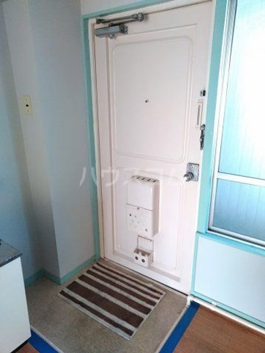 ニューマンション丸由の玄関