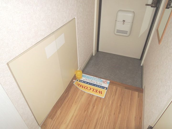 向ヶ丘レジデンス壱番館【ムコウガオカレジデンスイチバンカン】の玄関