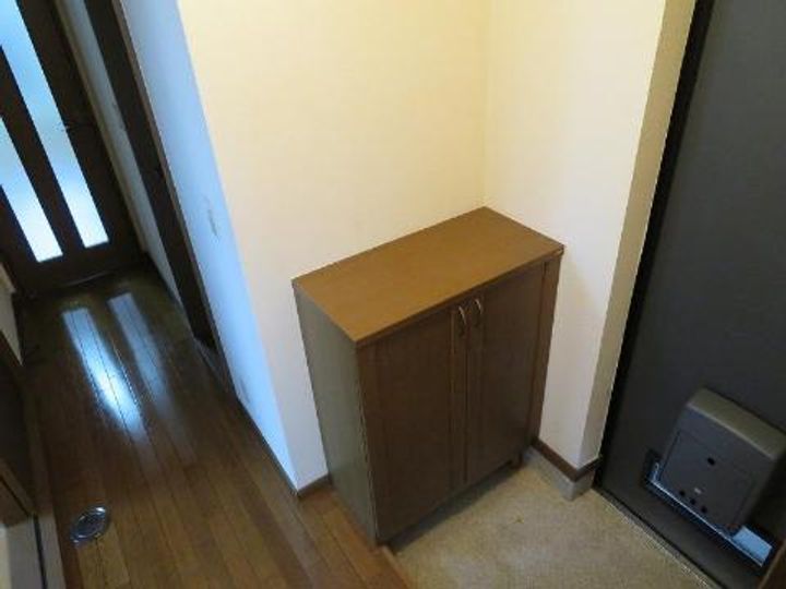 ステイタス長根の玄関