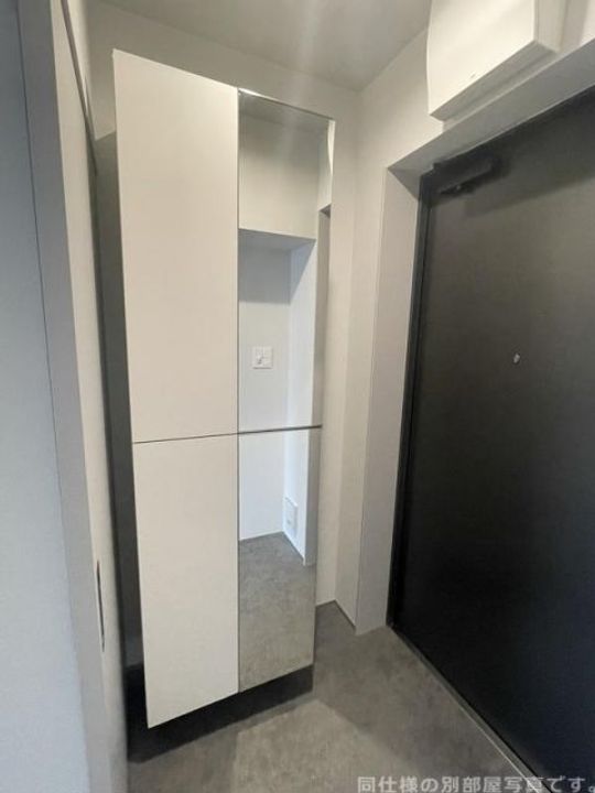 京都府京都市下京区西七条北衣田町の賃貸マンションの玄関