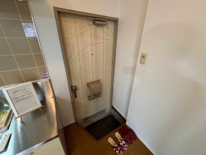 ハイツイイジマの玄関