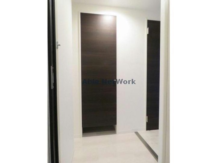 シティレジデンス桑園の玄関