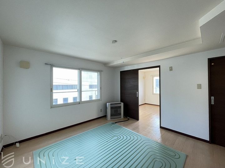 北海道札幌市豊平区豊平四条7(マンション)の賃貸物件の居間
