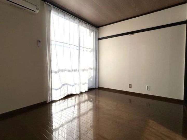 福島県郡山市安積町日出山字一本松(アパート)の賃貸物件の居間