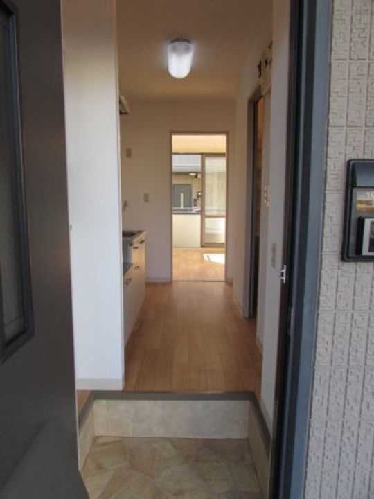 グランデソーニョA棟の玄関