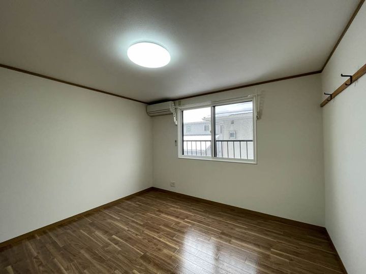 新潟県長岡市三ツ郷屋町(アパート)の賃貸物件の居間