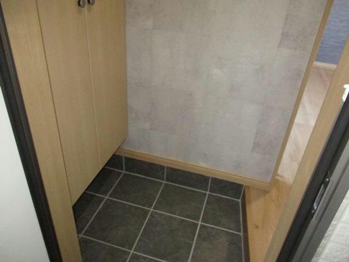 コスモアベニュー東光の玄関