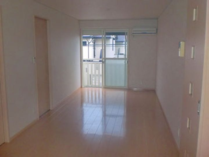 コーポルピナスの居間