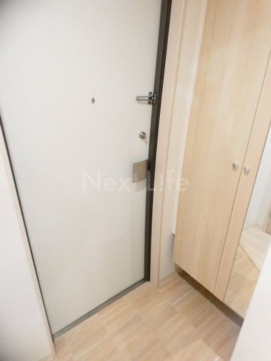 ピースコート登戸3の玄関