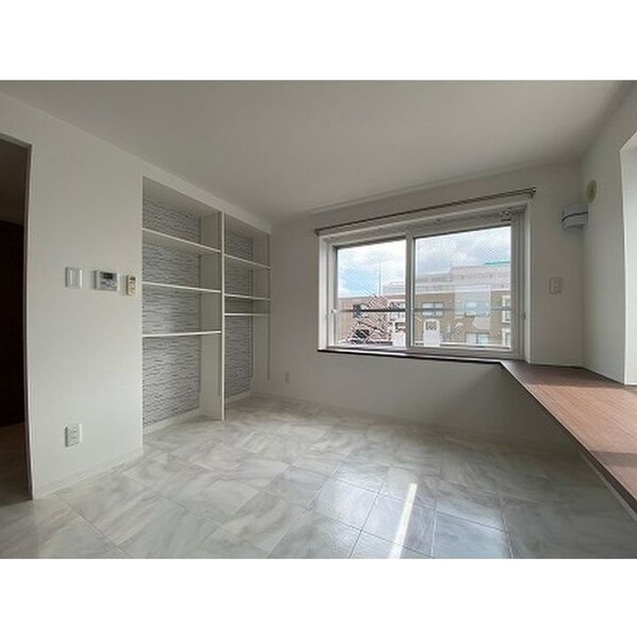 北海道札幌市北区新琴似六条1(マンション)の賃貸物件の居間