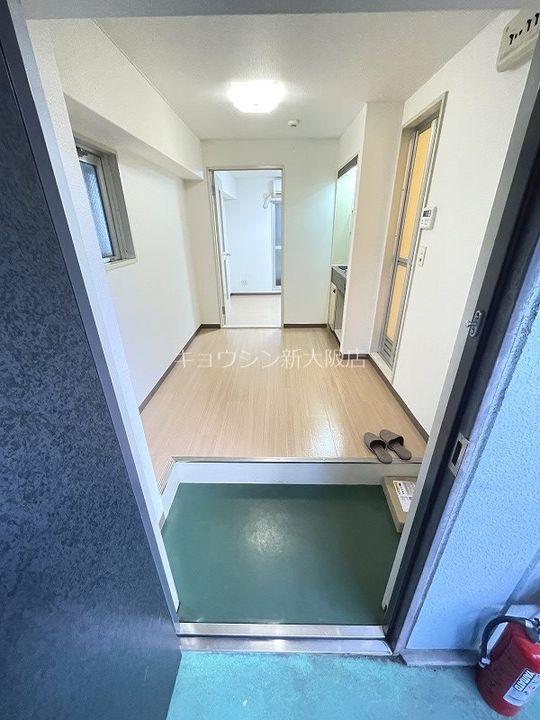 エーデルワイス塚本の玄関