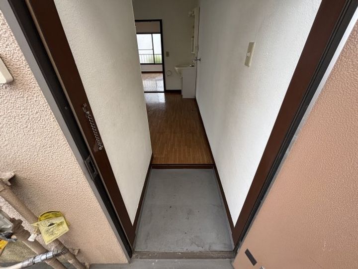ベルメゾン菊地の玄関