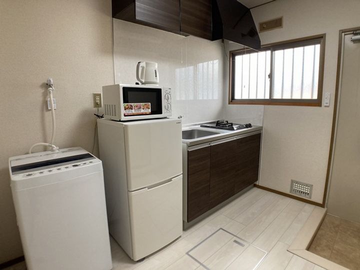 ファーニッシュド・ステイ諏訪城南1の居間