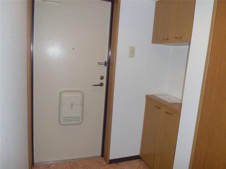 カトルズ中田IIの玄関