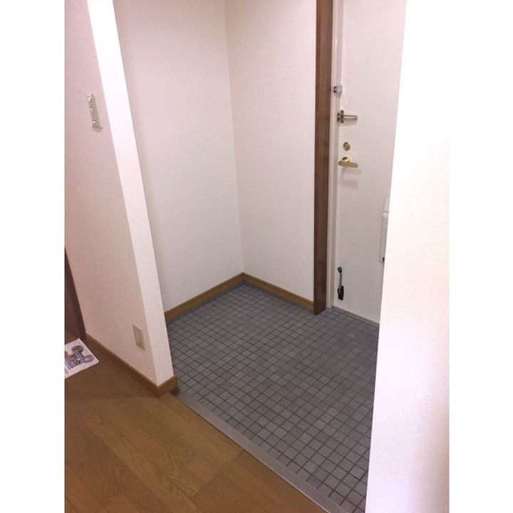 メゾンかしの木の玄関