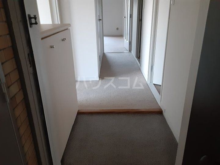 東京都日野市程久保8(マンション)の賃貸物件の玄関