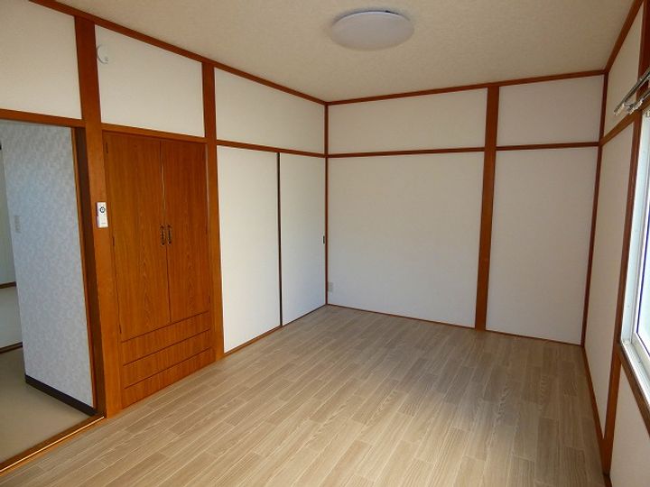 青森県十和田市東二十四番町(一戸建)の賃貸物件の居間