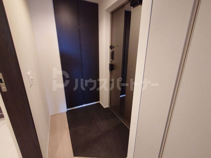 ザ・ライオンズフォーシア町屋の玄関