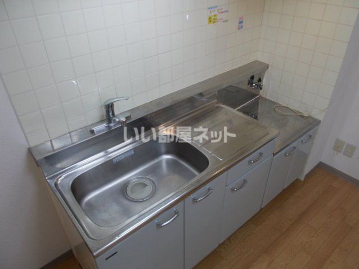 三重県名張市平尾(マンション)の賃貸物件のキッチン