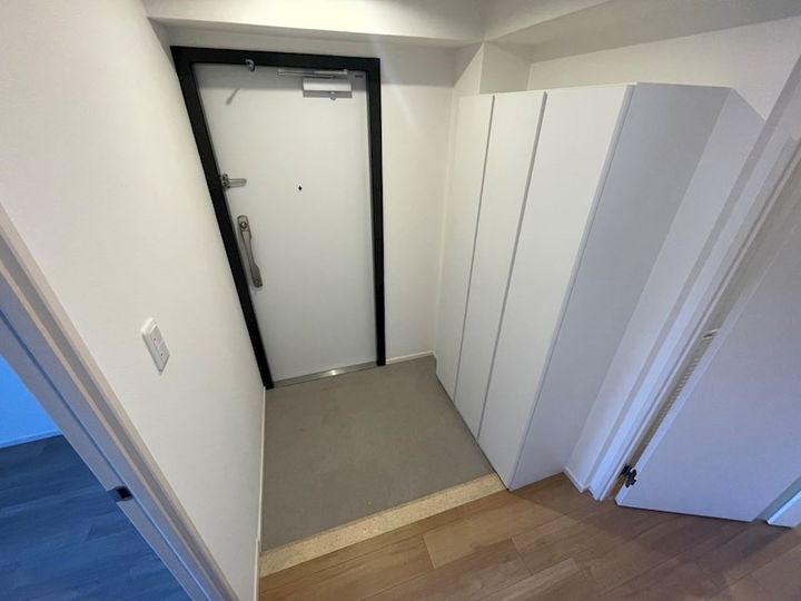 コンフォリア竹ノ塚イーストの玄関