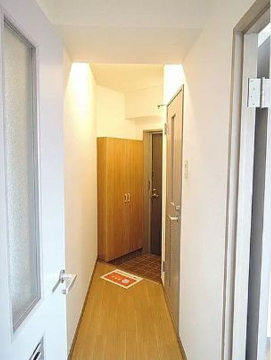 パールモア新井堂の玄関