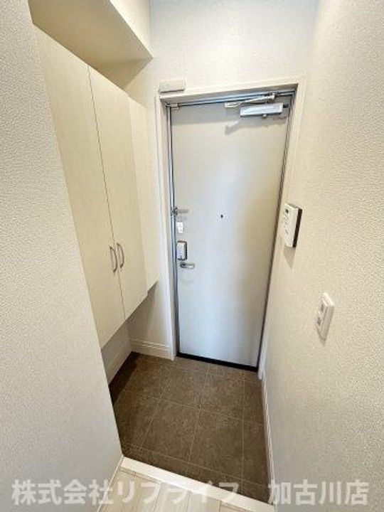 メゾンベルハープの玄関