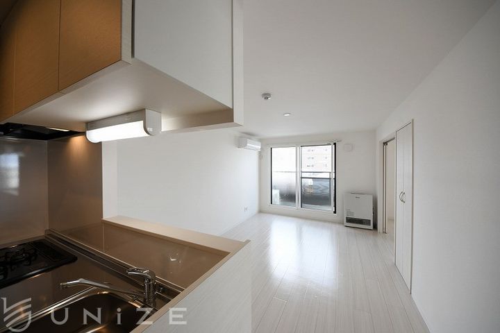 北海道札幌市豊平区月寒西一条7(マンション)の賃貸物件の居間