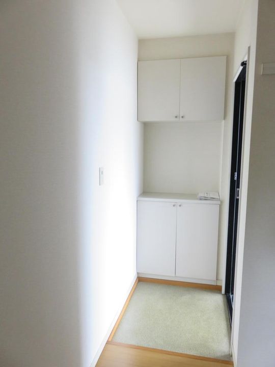 コゥジィーコートCの玄関