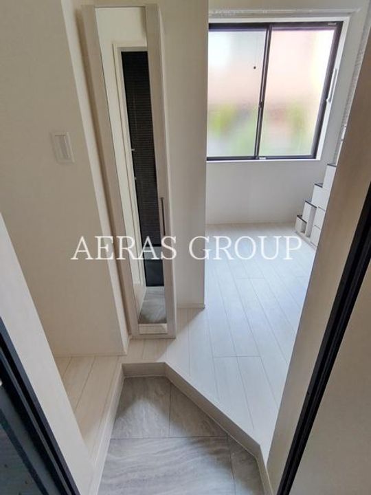 ハーモニーテラス江原町IIIの玄関