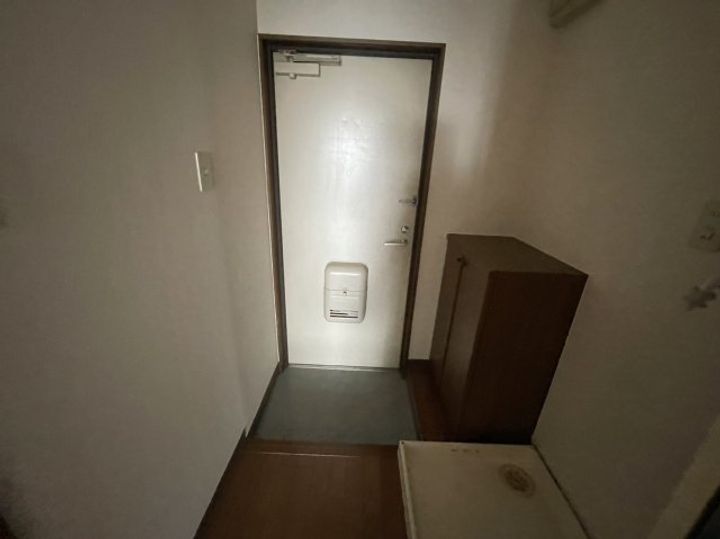 Uマンション阿倉川の玄関