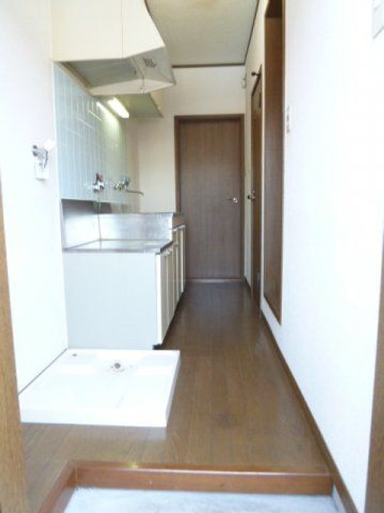 大阪府箕面市牧落1の賃貸アパートの玄関