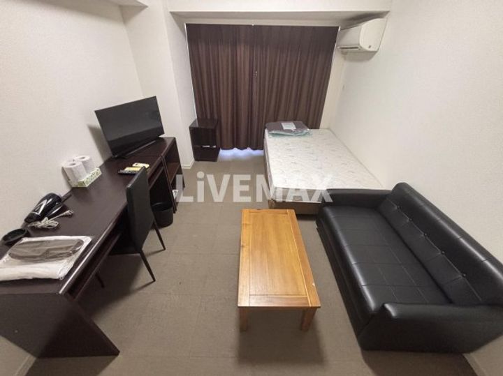 オーパスホームズ三田の居間