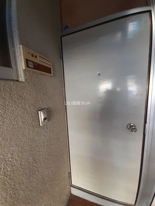 コーポ富岡の玄関