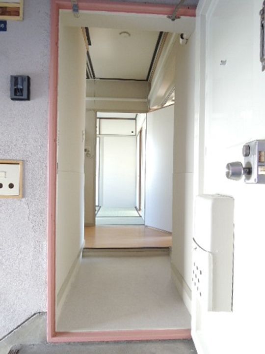 公社賃貸SMALIO 香里三井の玄関