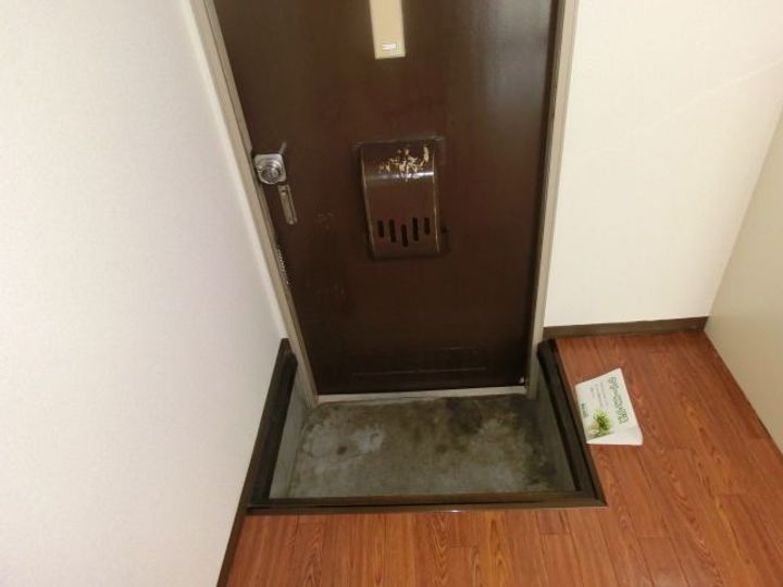 ハピネス千代IIIの玄関