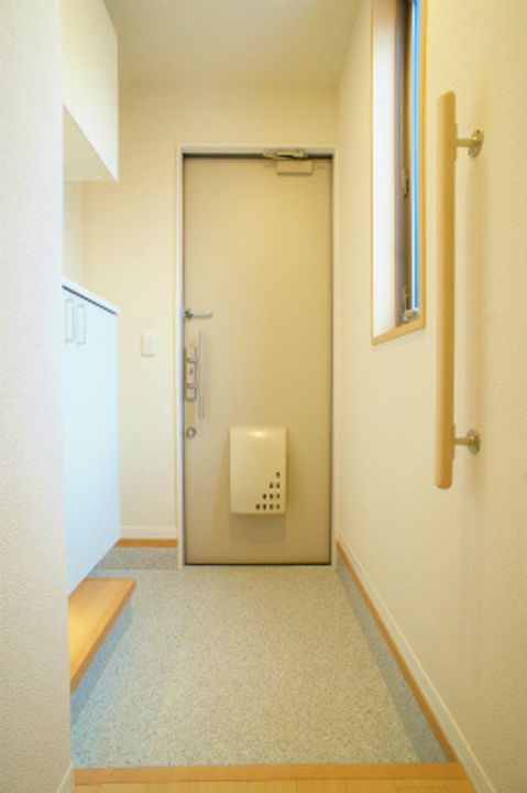 シャルム稲丘の玄関