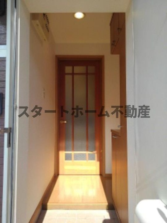 徳島県板野郡藍住町住吉字神蔵(アパート)の賃貸物件の玄関