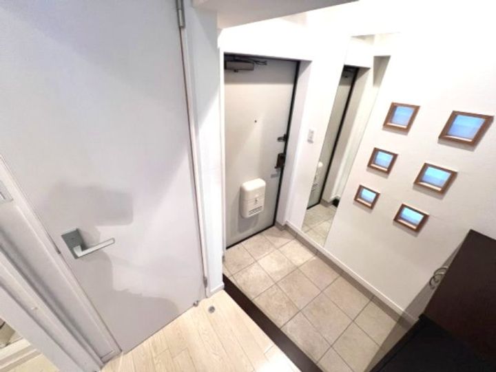 コォーリングマンションの玄関