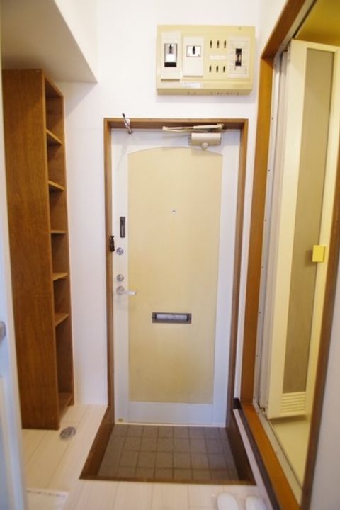 エクシード柿生の玄関