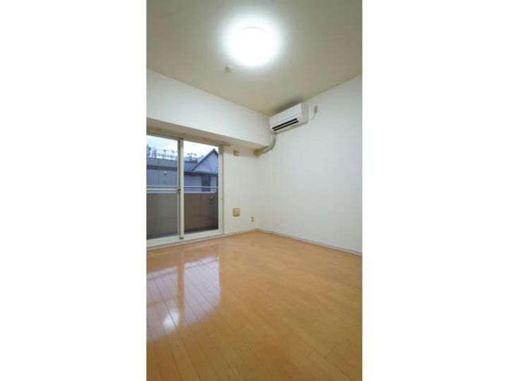 グランドハイツ末広311の居間