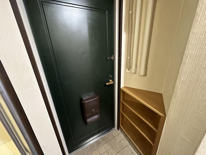 ベルシティプルナスの玄関