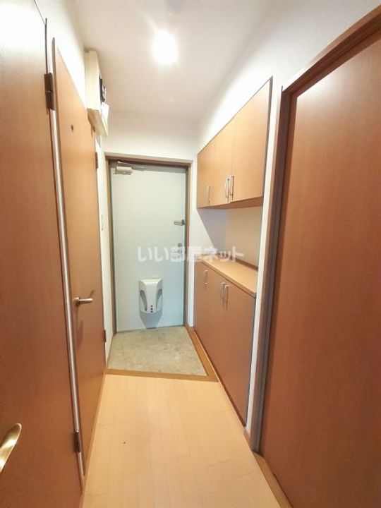 コンフォート鴻之台の玄関