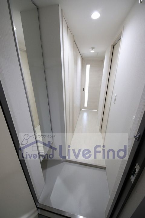 メニーズコート豊平川の玄関