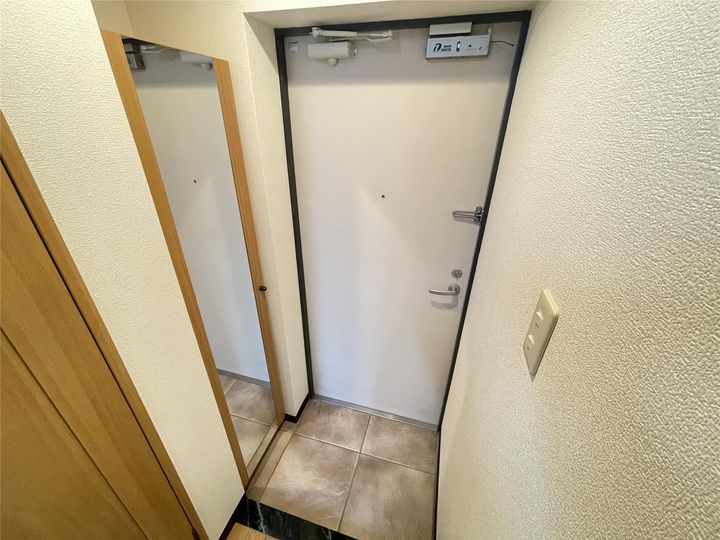 ハピネス小新の玄関